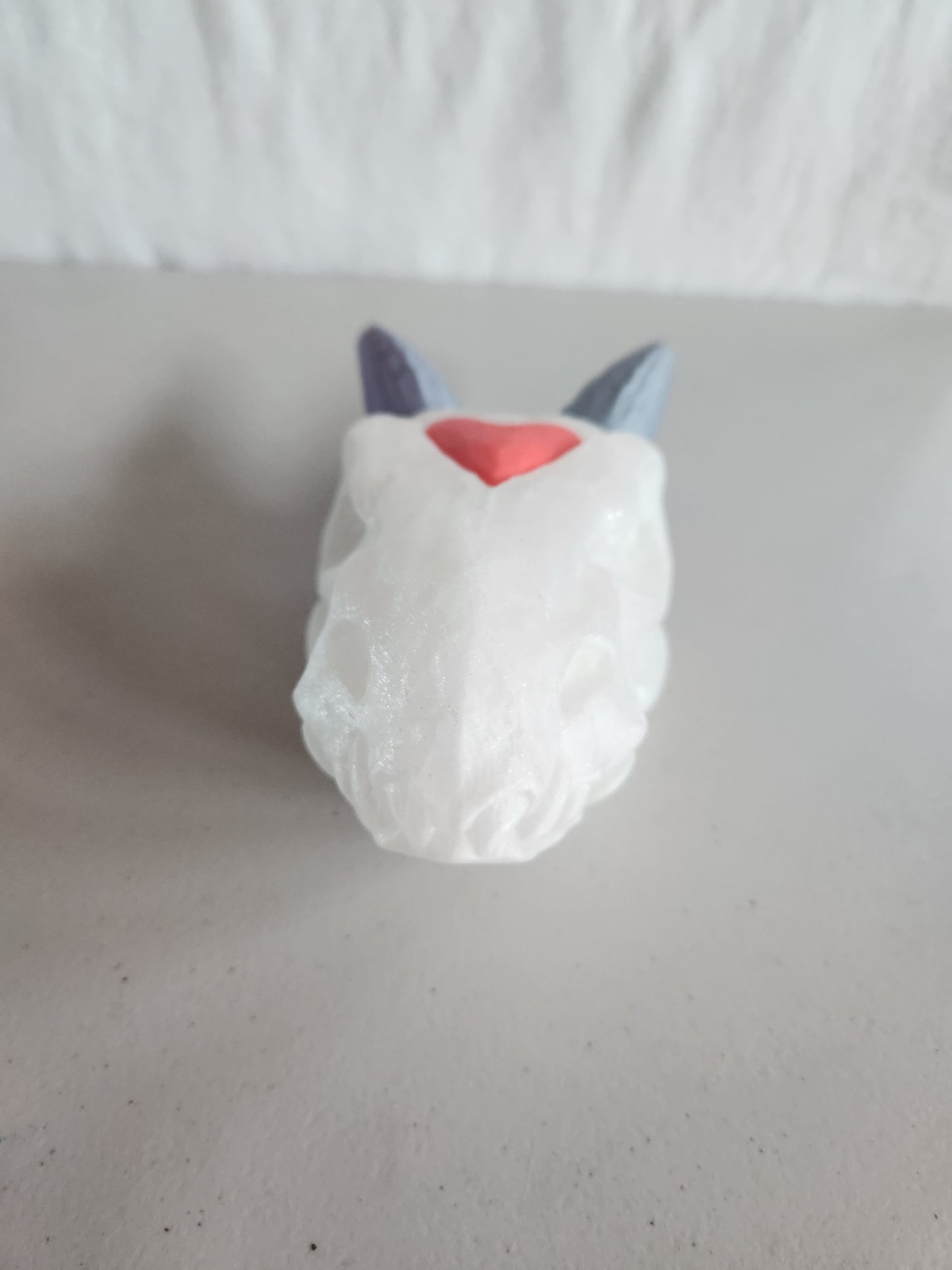 Dragon head with heart