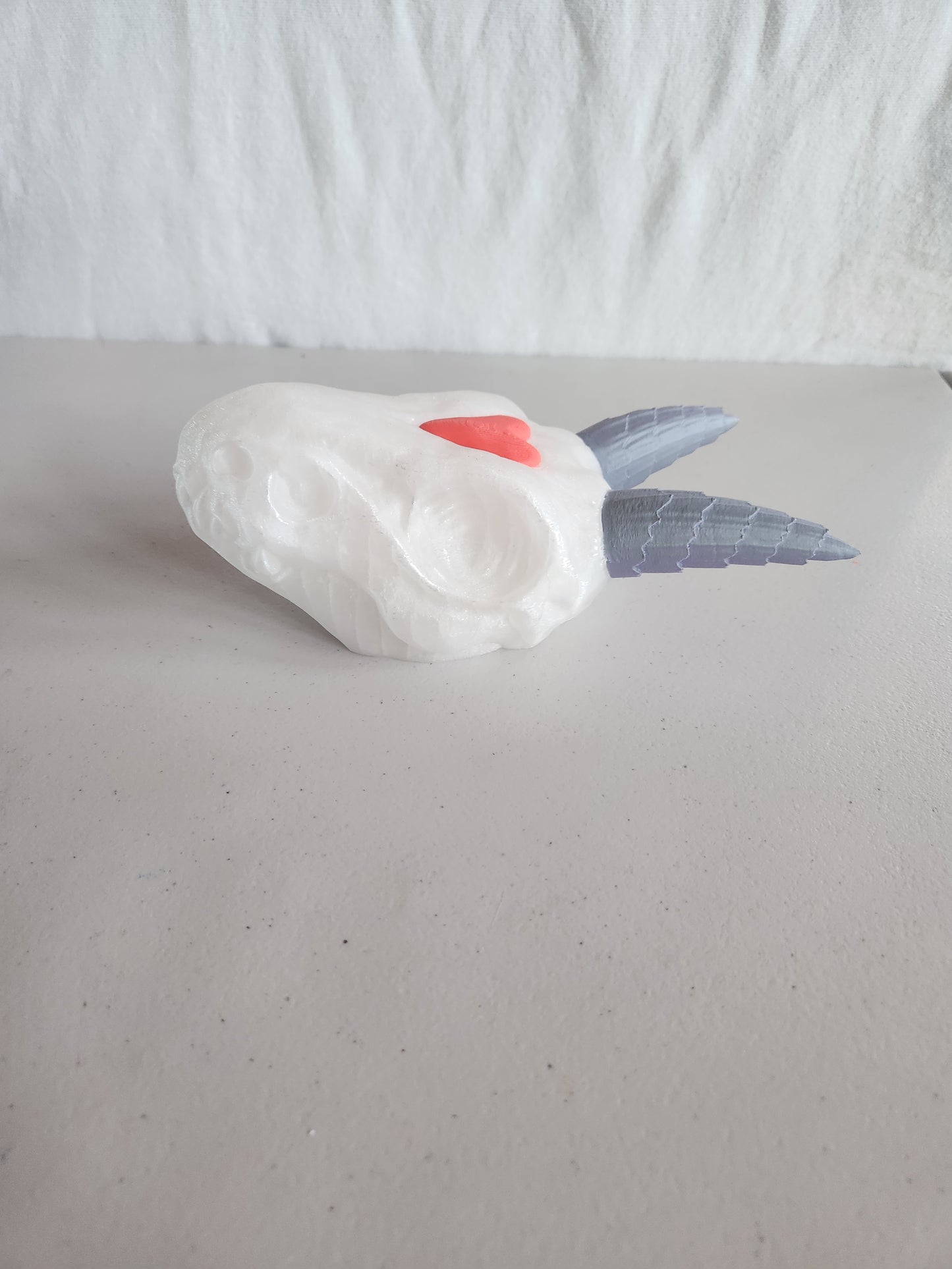 Dragon head with heart