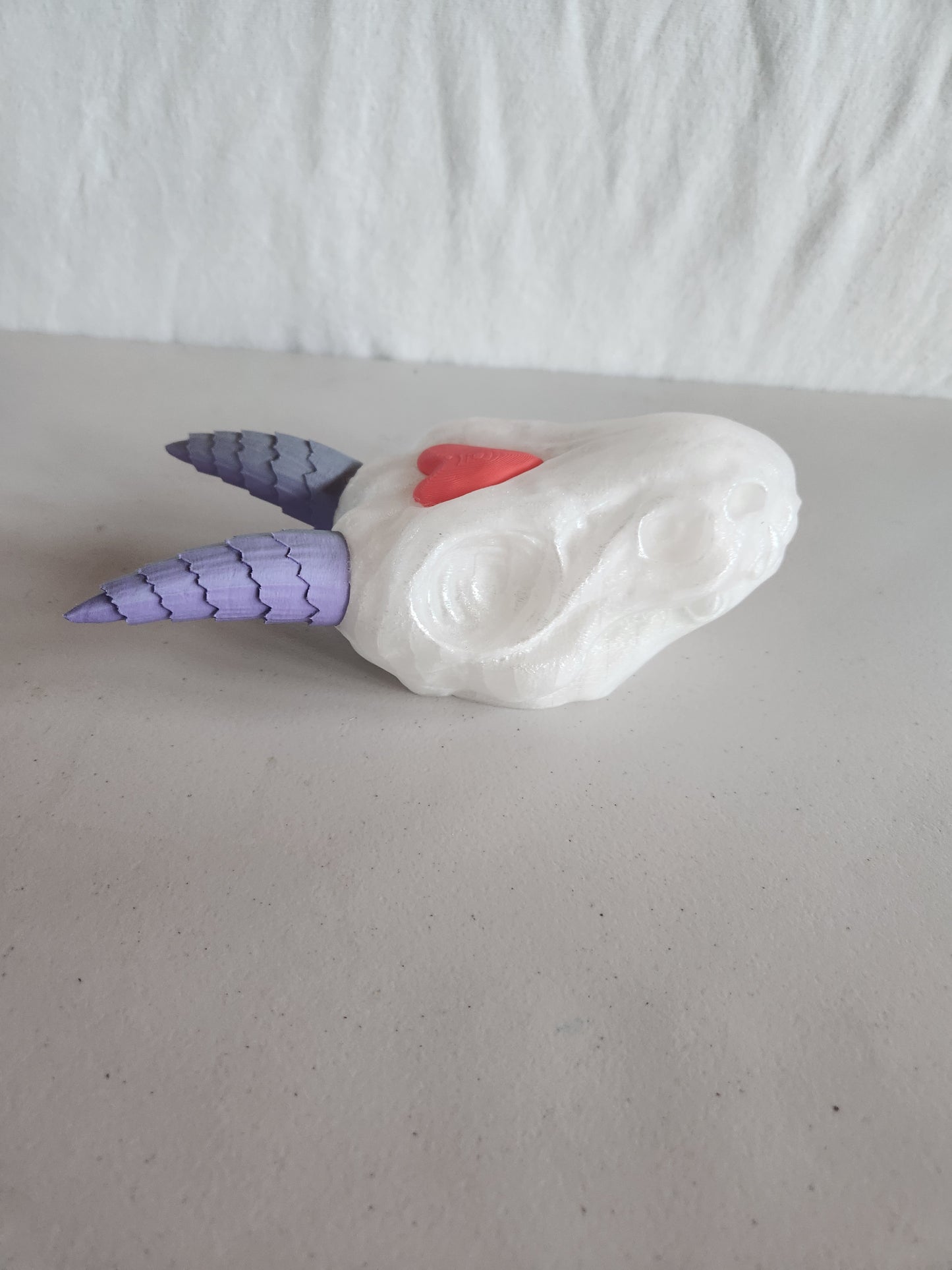 Dragon head with heart
