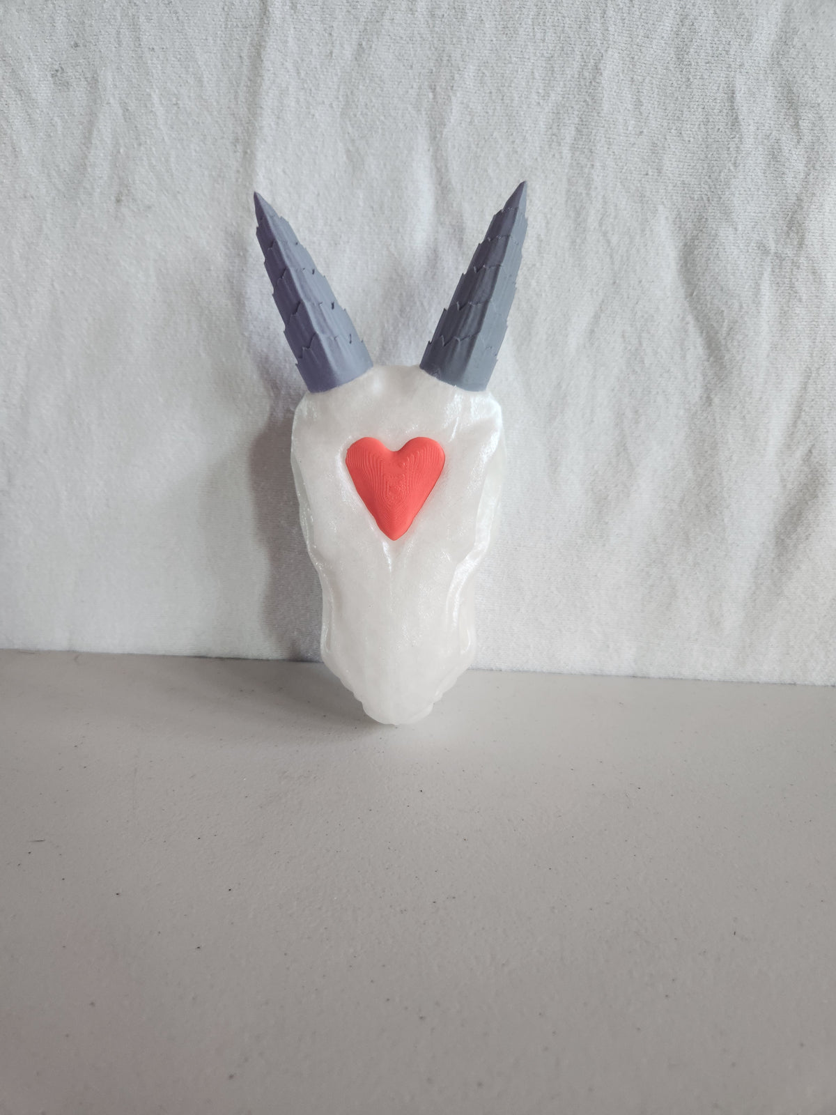 Dragon head with heart