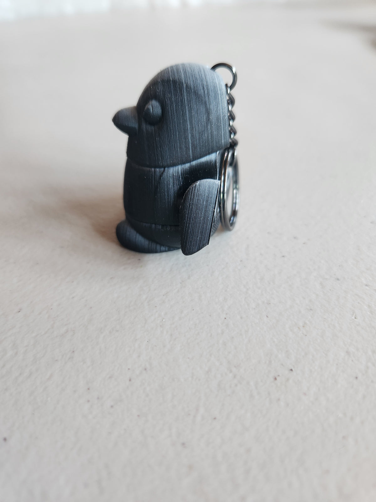 Penguin keychains, single