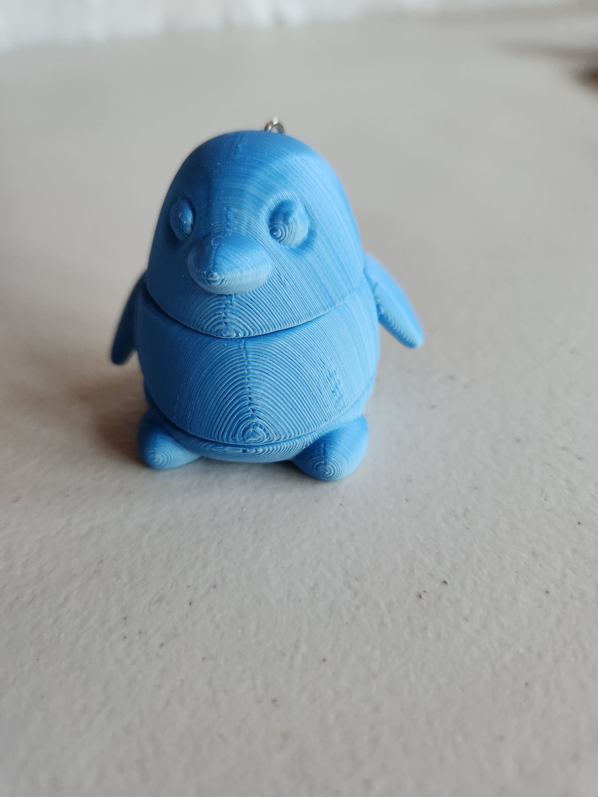 Penguin keychains, single