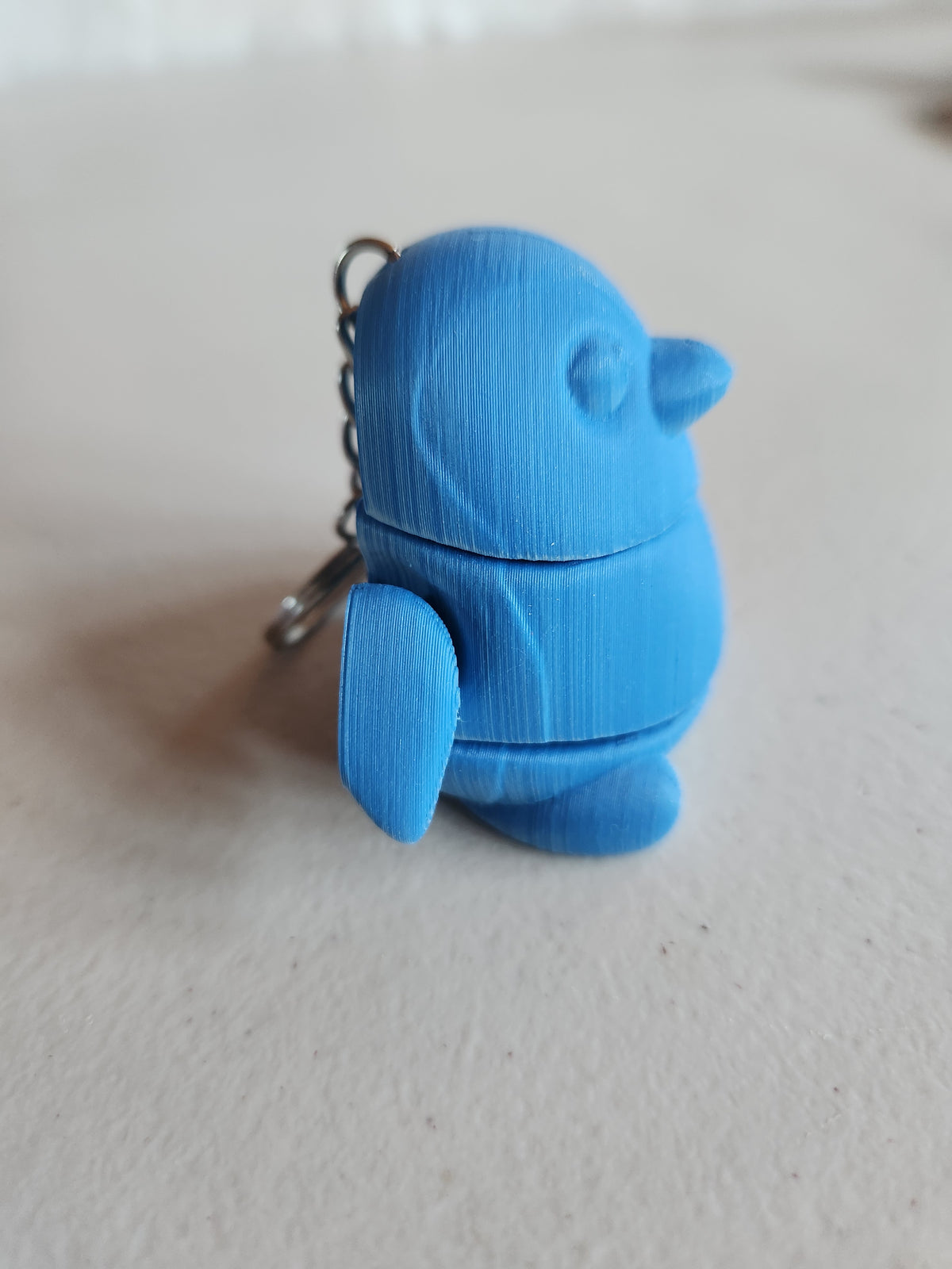 Penguin keychains, single