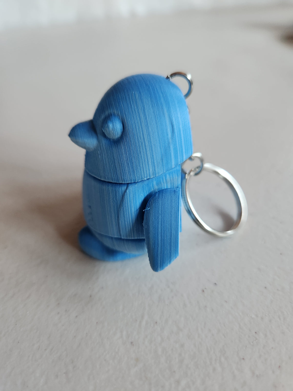 Penguin keychains, single