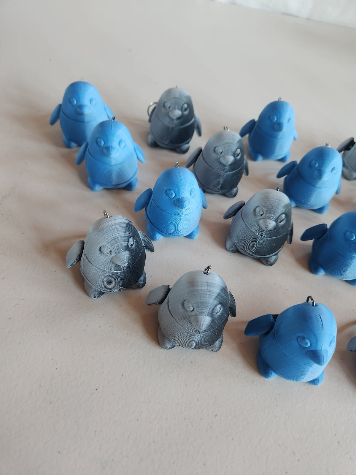 Penguin keychains, single