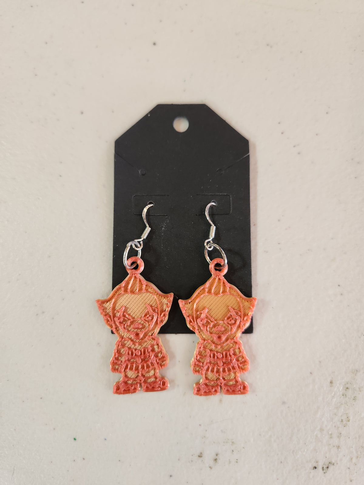 Pennywise earrings