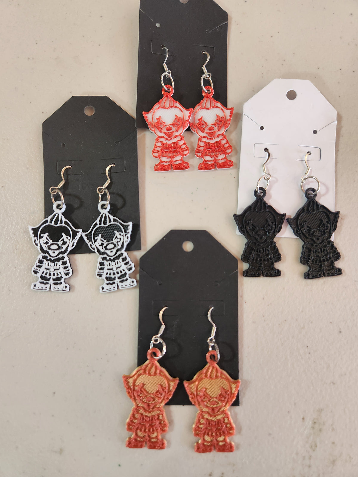 Pennywise earrings