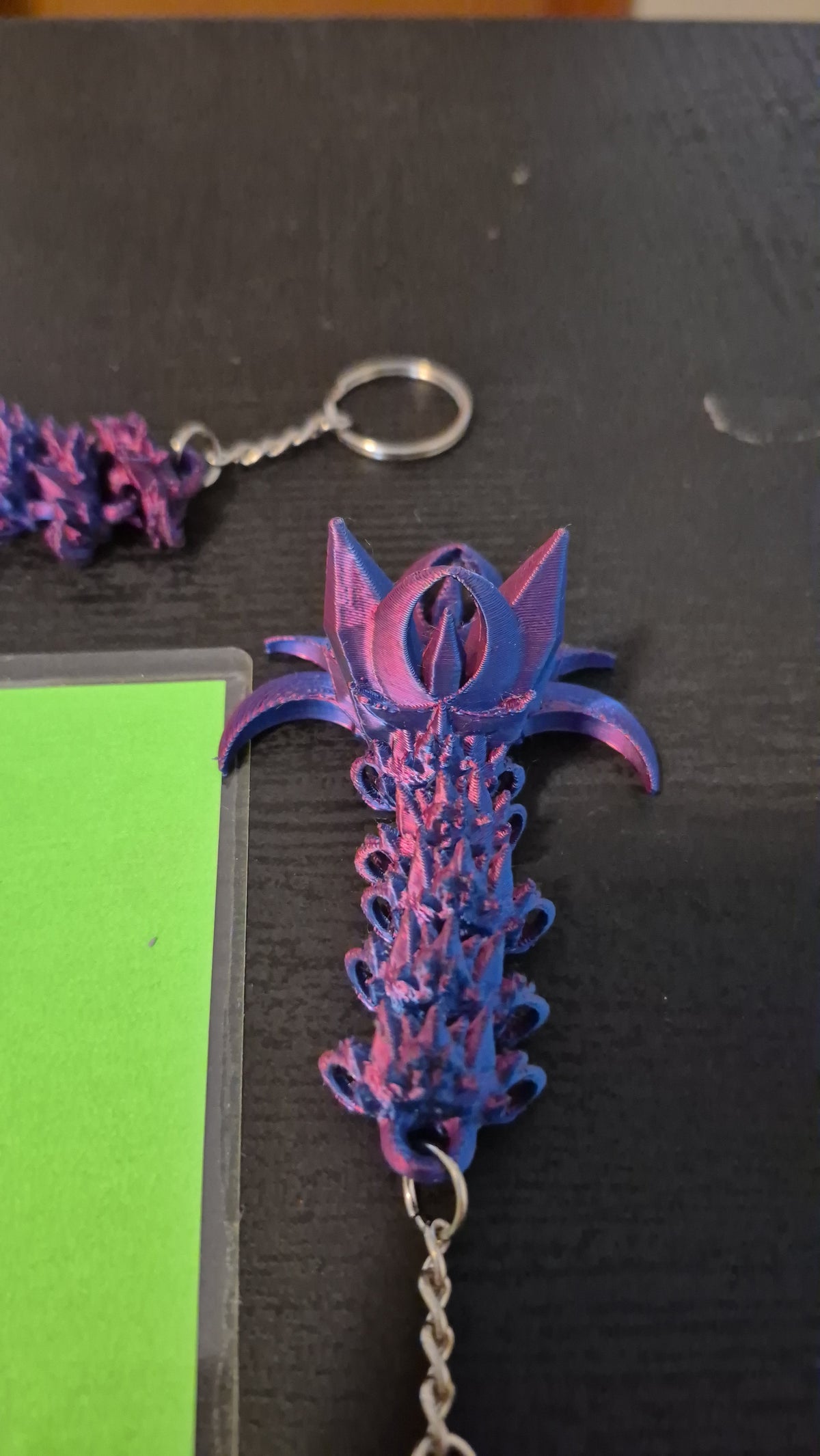 Nightwing tail keychains