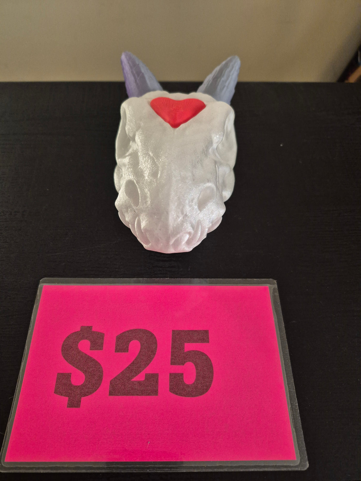 Dragon head with heart