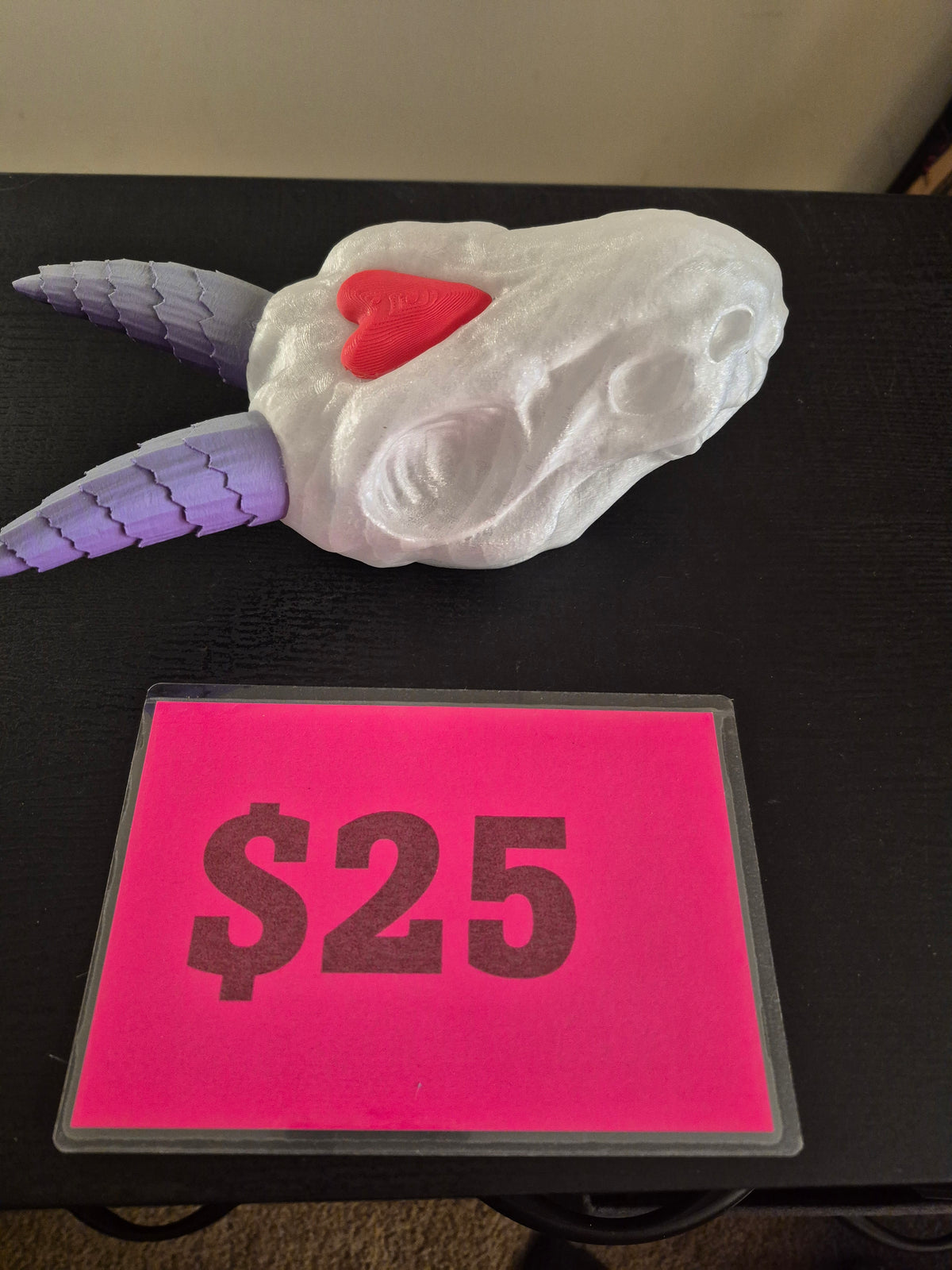 Dragon head with heart