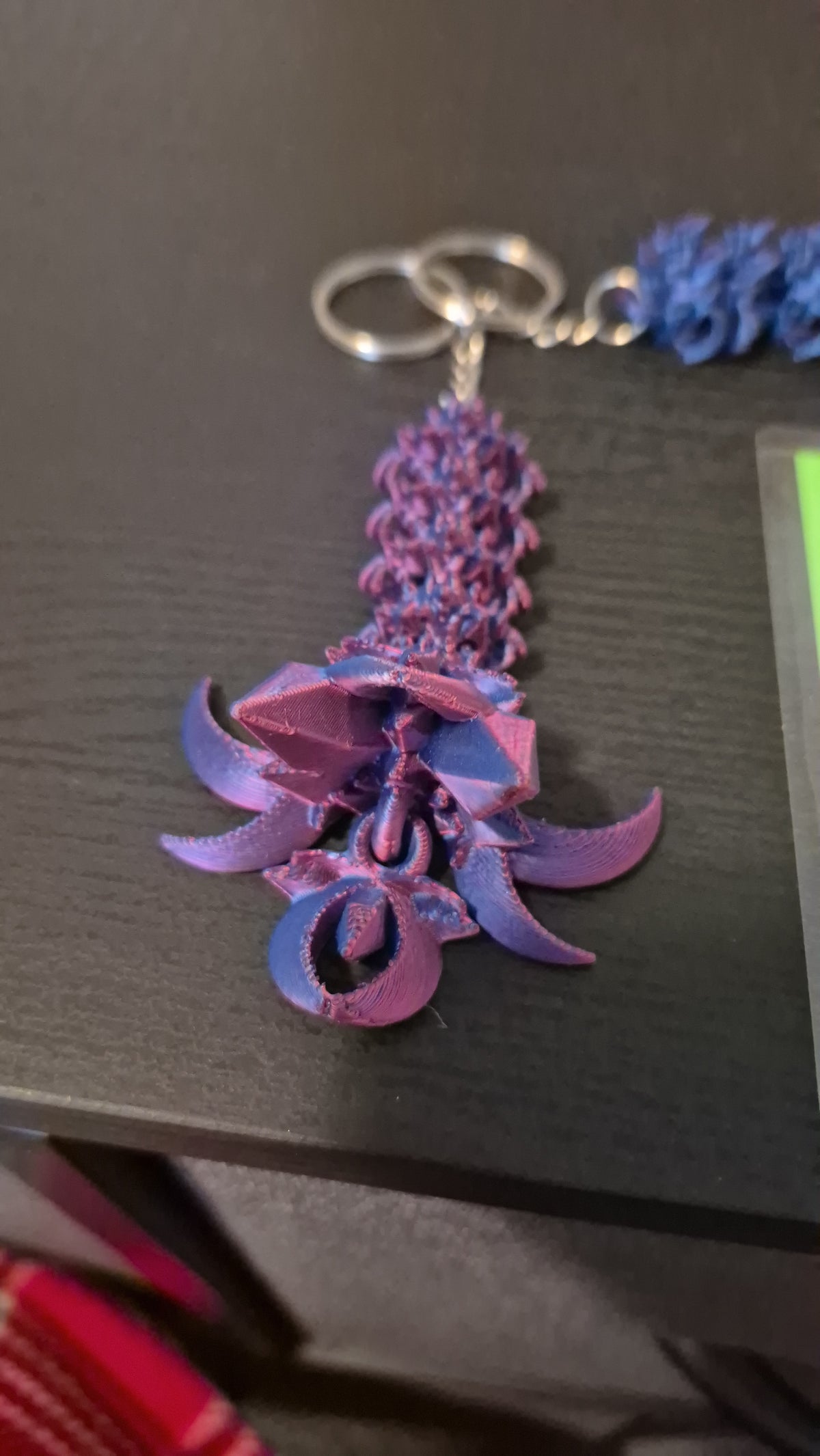 Nightwing tail keychains