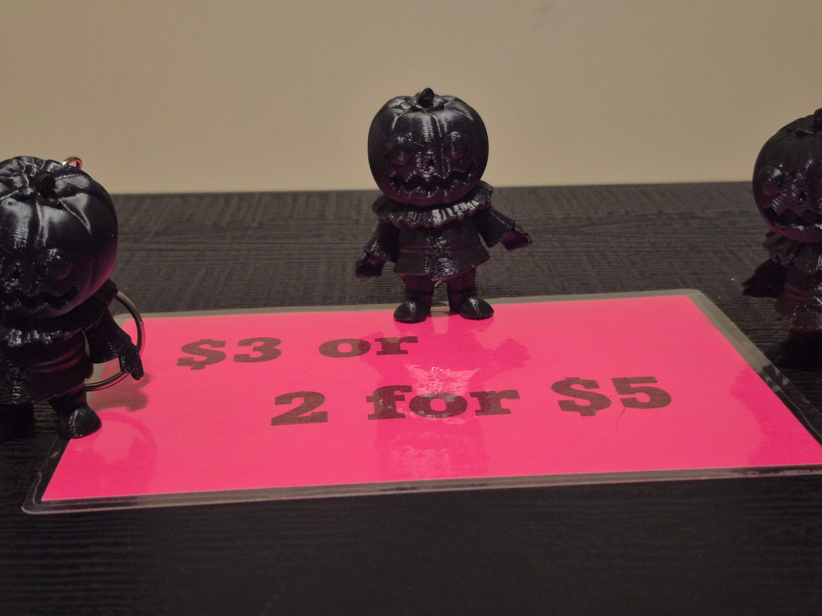 Pumpkin man keychains, 2 for $5 made by 3D printing