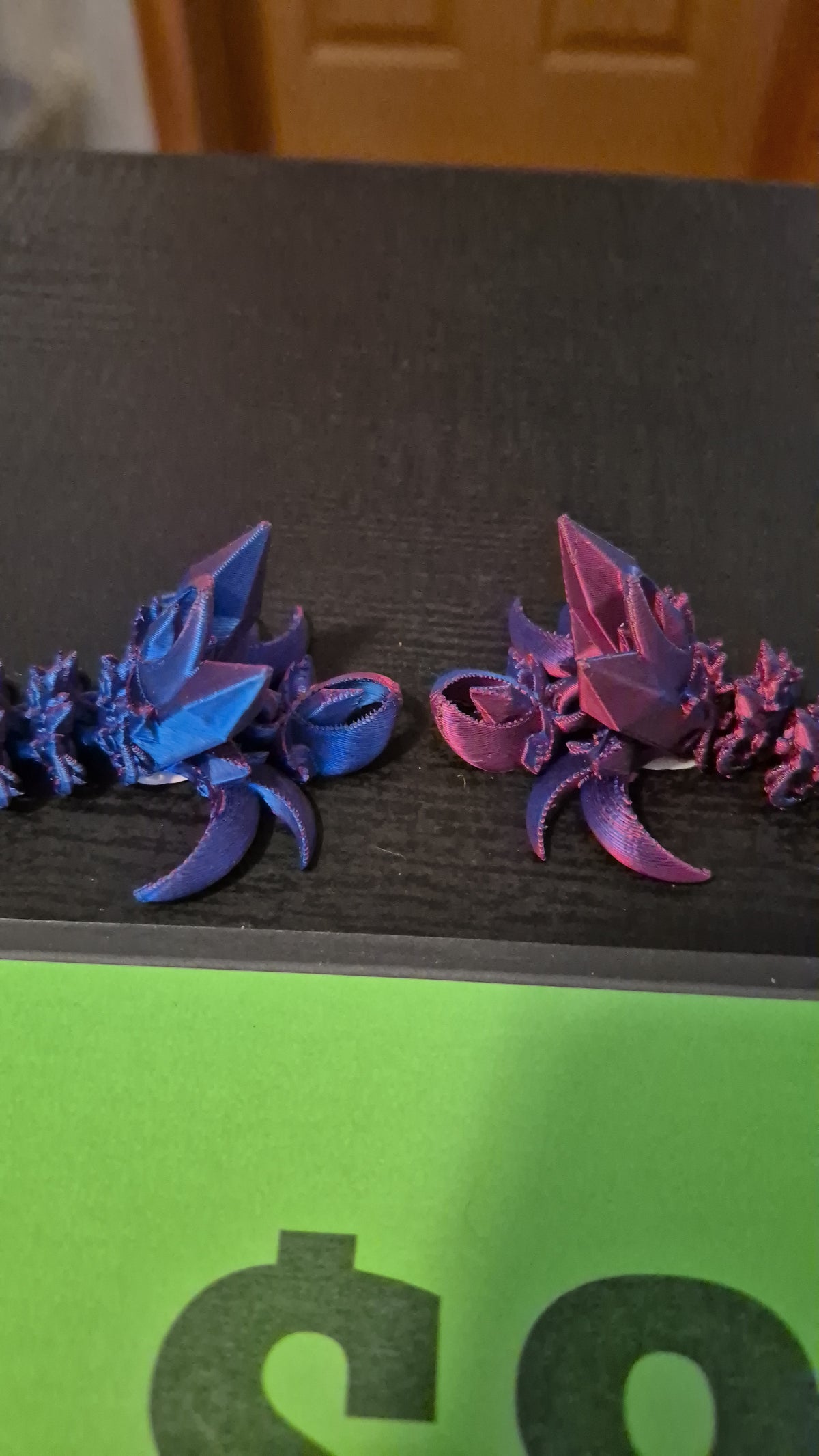 Nightwing tail keychains
