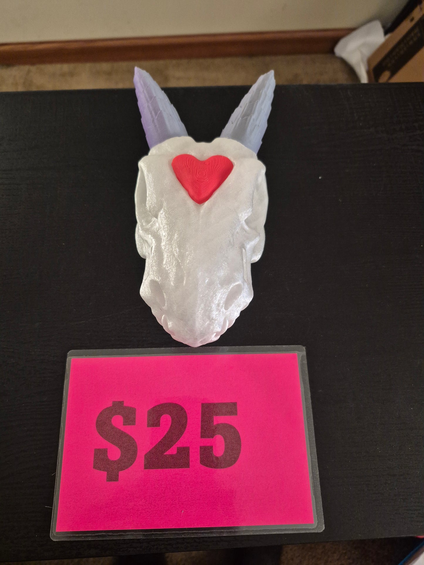 Dragon head with heart