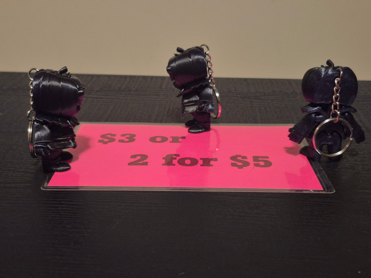 Pumpkin man keychains, 2 for $5 made by 3D printing