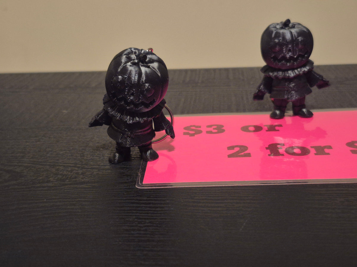 Pumpkin man keychains, 2 for $5 made by 3D printing