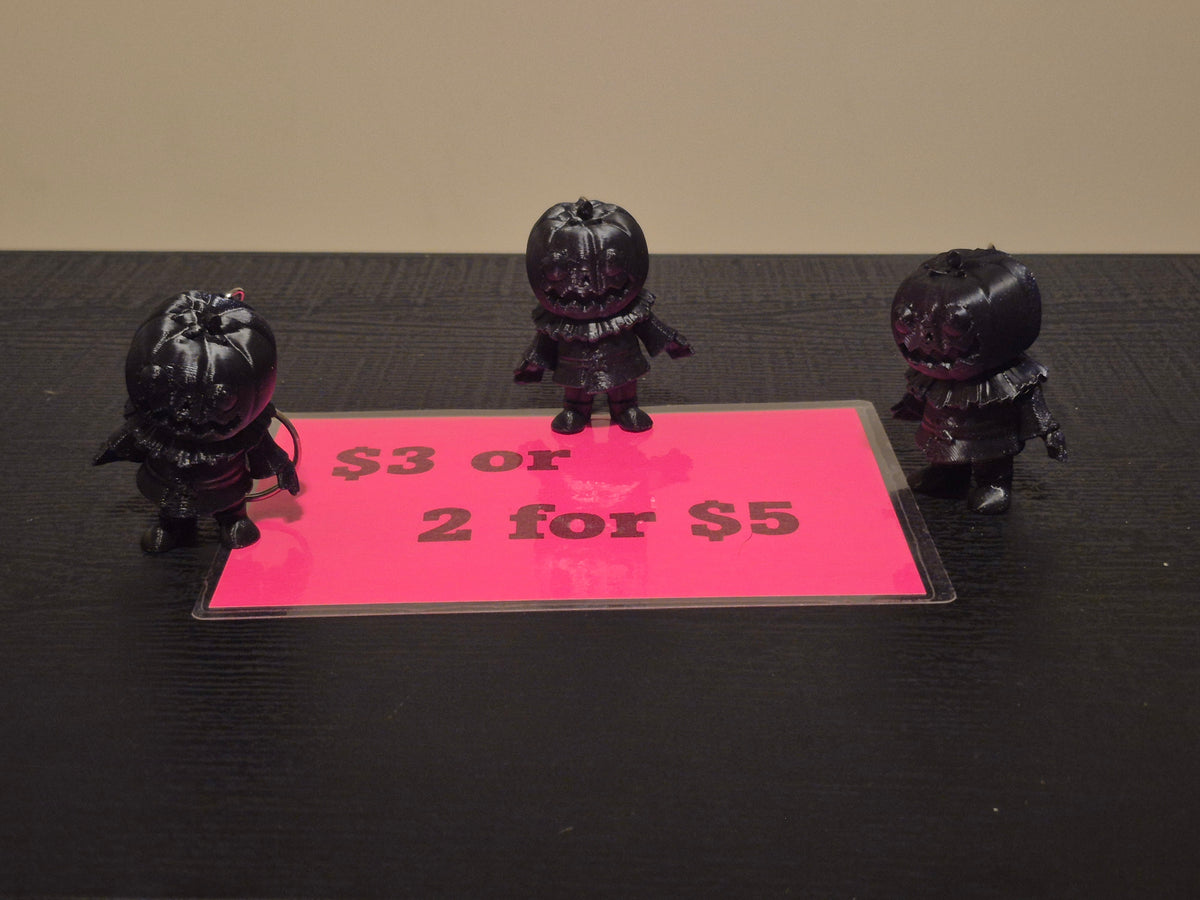 Pumpkin man keychains, 2 for $5 made by 3D printing